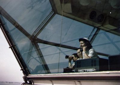 Color photo of WAVE working as aircraft control tower operator